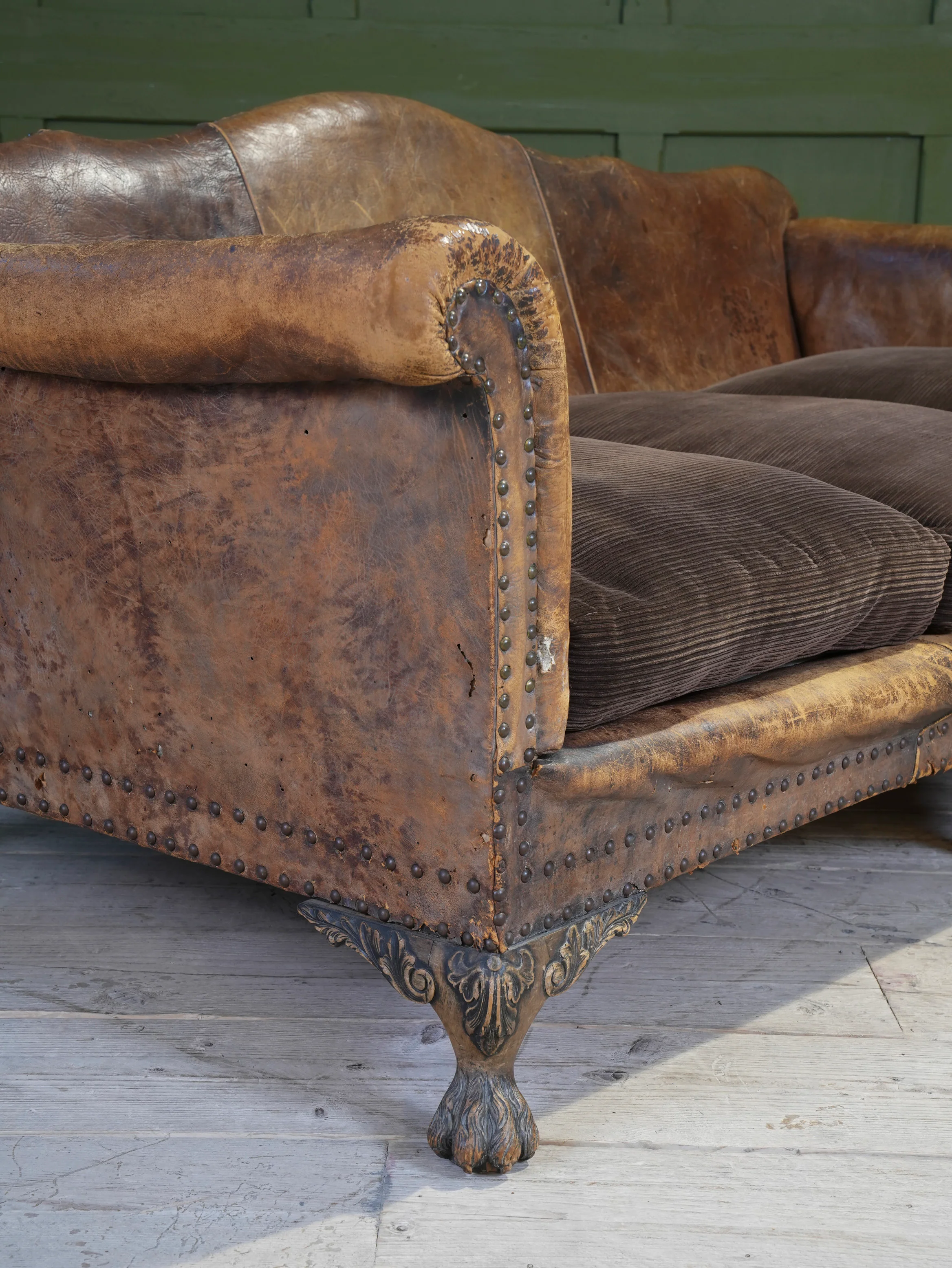 A Large Leather Camelback Sofa - Image 14