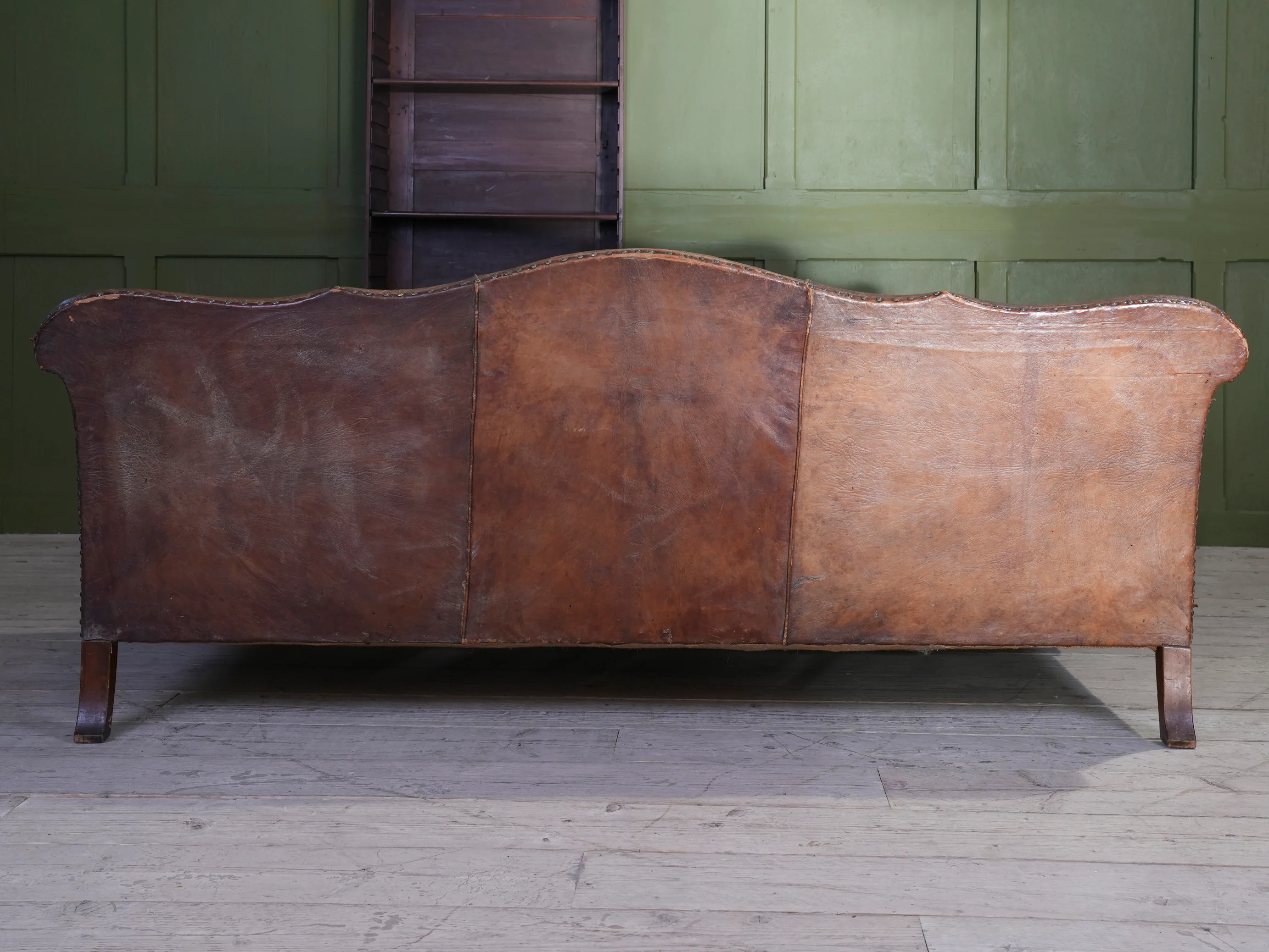 A Large Leather Camelback Sofa - Image 22