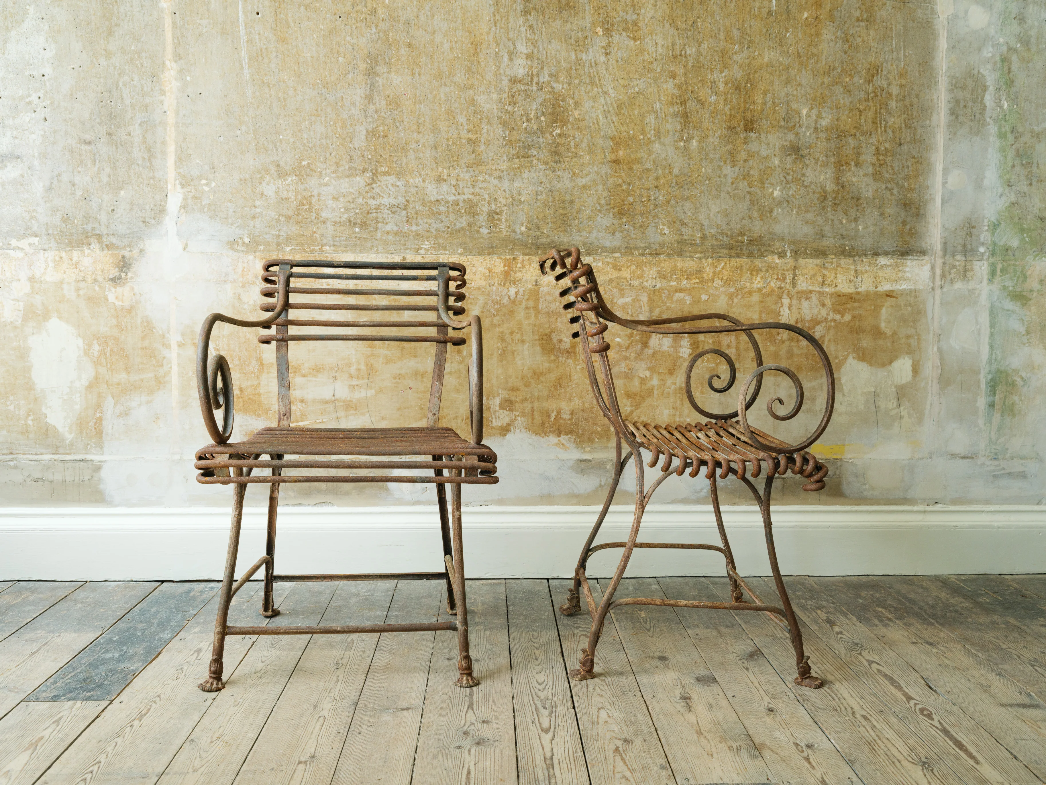 A Pair Of Arras Armchairs