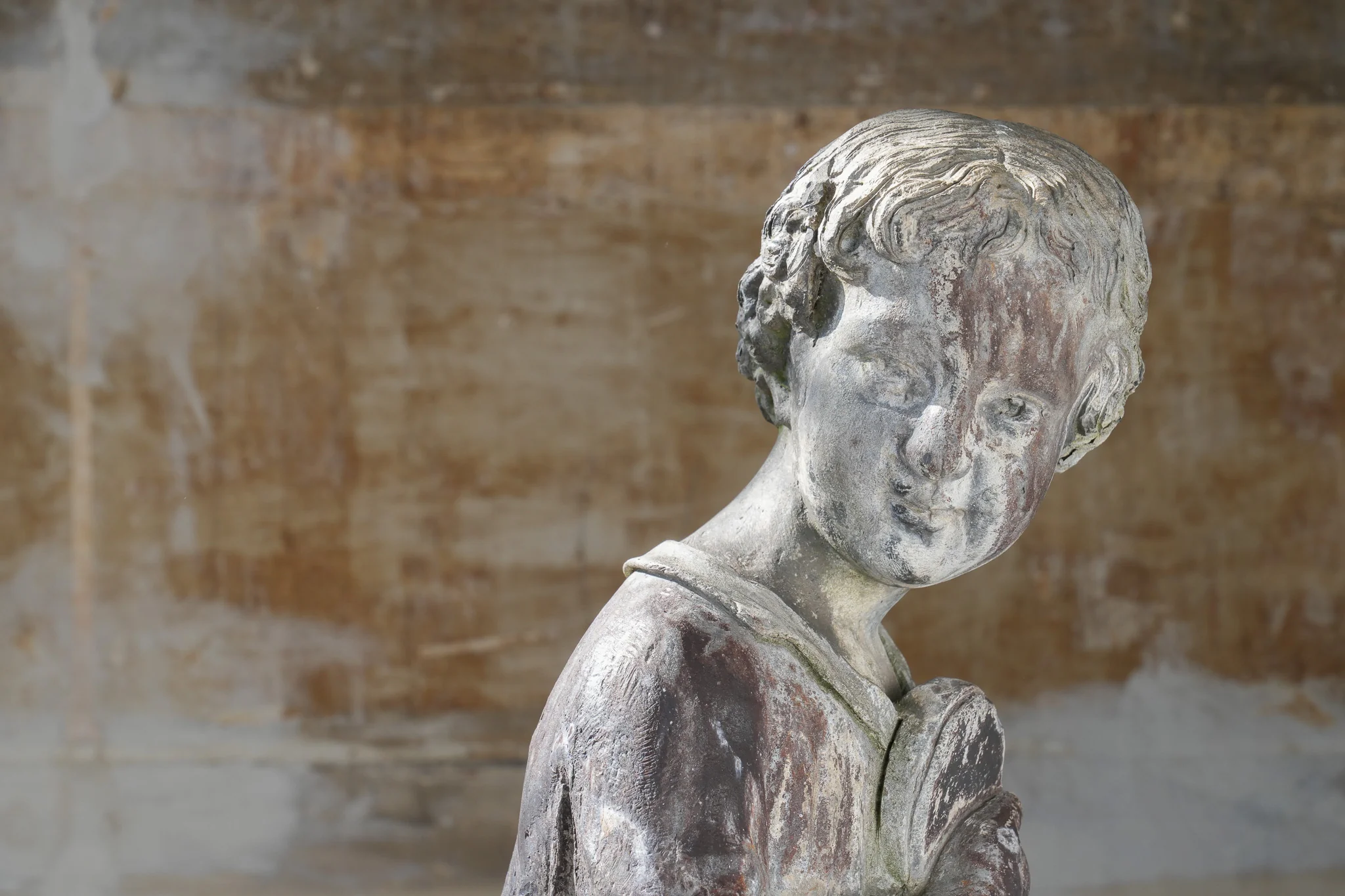 A Lead Statue of a Boy - Image 4